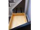 Close up of a storage drawer under the staircase at 1496 Cypress Pointe Dr, Mount Pleasant, SC 29466