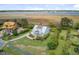 Gorgeous aerial view of a luxurious home with waterfront views and meticulously maintained grounds at 1500 Bower Ln, Johns Island, SC 29455