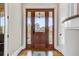 Entryway with wood floors and front door with sidelights at 1500 Bower Ln, Johns Island, SC 29455