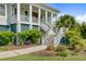 Inviting front entrance with a welcoming staircase and lush landscaping at 1500 Bower Ln, Johns Island, SC 29455