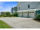 Spacious three-car garage with a large driveway at 1500 Bower Ln, Johns Island, SC 29455