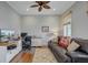 Cozy office with hardwood floors, a comfortable leather sofa, and a functional workspace at 1500 Bower Ln, Johns Island, SC 29455