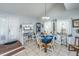 Bright dining area features tile floors, white furniture, and an adjacent sitting area for relaxed living at 1518 Southwick Dr, Johns Island, SC 29455