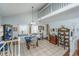 Cozy dining space with tiled floors, vaulted ceiling, and farmhouse decor showcases charm and character at 1518 Southwick Dr, Johns Island, SC 29455