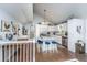 Bright kitchen and dining area feature white cabinets, stainless steel appliances, and a vaulted ceiling at 1518 Southwick Dr, Johns Island, SC 29455
