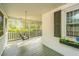 Charming screened porch featuring a swing, offering a relaxing outdoor space at 1518 Southwick Dr, Johns Island, SC 29455
