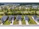 New homes are displayed in an aerial view showing driveways, roofs, and landscaping in a suburban setting at 153 Lucca Dr, Summerville, SC 29486