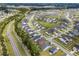 An aerial view of a Primary-planned community with winding streets, cul-de-sacs, and many single Gathering homes at 153 Lucca Dr, Summerville, SC 29486
