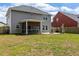 Well-maintained backyard featuring a patio, screened porch, fire pit, and comfortable seating at 153 Lucca Dr, Summerville, SC 29486