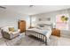 Comfortable bedroom with a large window, stylish decor, and a comfortable bed at 153 Lucca Dr, Summerville, SC 29486