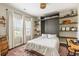 Bedroom with a pull down bed, shelving, large windows with natural light and colorful rug at 153 Lucca Dr, Summerville, SC 29486