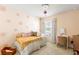 Bright bedroom with soft decor, a window with curtains, and a cozy sleeping area at 153 Lucca Dr, Summerville, SC 29486