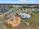Community pool and playground, featuring ample parking, lounge chairs, landscaping, and Gathering-friendly amenities at 153 Lucca Dr, Summerville, SC 29486