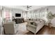 Cozy living room featuring neutral tones, a modern entertainment center, and an open, airy ambiance at 153 Lucca Dr, Summerville, SC 29486