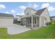 Backyard featuring a screened porch and detached garage at 154 Helena Park Dr, Summerville, SC 29486