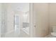 Bright primary bathroom featuring a soaking tub, walk-in shower, and double vanity at 154 Helena Park Dr, Summerville, SC 29486