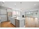 Open concept kitchen with stainless steel appliances, hardwood floors, and bright light at 154 Helena Park Dr, Summerville, SC 29486