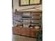 Marketplace display with shelves of various products including honey, sauces, and other packaged goods at 154 Helena Park Dr, Summerville, SC 29486