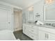 Luxurious bathroom featuring a double vanity, frameless shower, and ample storage at 155 Wingo Way # 433, Mount Pleasant, SC 29464