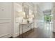 Inviting hallway featuring a console table, decorative lamps, and stylish wall decor at 155 Wingo Way # 433, Mount Pleasant, SC 29464