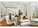Elegant lounge area with stylish seating, hardwood floors, and bright windows, perfect for gatherings at 155 Wingo Way # 433, Mount Pleasant, SC 29464