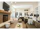Well-lit lounge featuring comfortable seating, fireplace, and ample natural light for a relaxing atmosphere at 155 Wingo Way # 433, Mount Pleasant, SC 29464