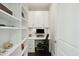 Well-organized office space with custom built-ins, desk, and ample storage at 155 Wingo Way # 433, Mount Pleasant, SC 29464