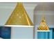 Stylish gold pendant lights that add a touch of modern elegance to the interior space at 155 Wingo Way # 433, Mount Pleasant, SC 29464