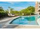 Inviting outdoor swimming pool with lounge chairs and clear blue water for relaxation and enjoyment at 155 Wingo Way # 433, Mount Pleasant, SC 29464