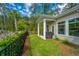 Lush backyard with covered patio and security system at 1623 Adventure Xing # 109, Mount Pleasant, SC 29466