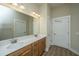 Bathroom featuring double sinks, decorative lights, and a tile floor at 1623 Adventure Xing # 109, Mount Pleasant, SC 29466