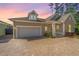 Charming home with a brick driveway and well-manicured landscaping offers great curb appeal at 1623 Adventure Xing # 109, Mount Pleasant, SC 29466