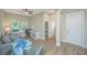 Relaxing living room offers a ceiling fan and space for an office setup at 1623 Adventure Xing # 109, Mount Pleasant, SC 29466
