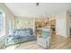 Spacious open-concept living area connects to a well-equipped kitchen with modern appliances at 1623 Adventure Xing # 109, Mount Pleasant, SC 29466