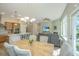 Open concept living space showcases seamless flow from kitchen to dining and living areas at 1623 Adventure Xing # 109, Mount Pleasant, SC 29466