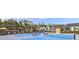 Outdoor pickleball court in a quiet wooded area with community homes in the background at 1623 Adventure Xing # 109, Mount Pleasant, SC 29466