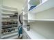 Spacious walk-in closet featuring organized shelving and storage solutions for optimal organization at 1623 Adventure Xing # 109, Mount Pleasant, SC 29466