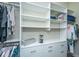 Large walk-in closet with custom shelving and ample space for clothes, shoes, and accessories at 1623 Adventure Xing # 109, Mount Pleasant, SC 29466