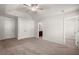 Large bedroom with neutral carpet, ceiling fan, closet, and ensuite bathroom access at 169 Longford Dr, Summerville, SC 29483