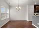 Dining area with modern chandelier and view of the kitchen at 169 Longford Dr, Summerville, SC 29483