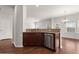 Eat-in kitchen featuring dark wood cabinetry, granite countertops, and stainless steel appliances at 169 Longford Dr, Summerville, SC 29483