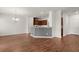 Open layout connects living room and kitchen, featuring hardwood floors at 169 Longford Dr, Summerville, SC 29483