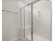 A sleek, modern shower with glass doors and bright lighting at 169 Longford Dr, Summerville, SC 29483