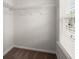 A walk-in closet with carpet flooring, white walls, and wire shelving provides efficient and organized storage at 169 Longford Dr, Summerville, SC 29483