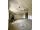 Spacious attic space with a ceiling fan and natural light at 1805 Wood Duck Rd, Moncks Corner, SC 29461
