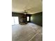 Cozy living room with a stone fireplace and natural light at 1805 Wood Duck Rd, Moncks Corner, SC 29461