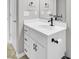 Clean modern bathroom with white fixtures and black faucet at 1954 Treebark Dr, Charleston, SC 29414