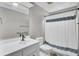 Clean bathroom featuring a modern sink, toilet, and shower curtain at 1954 Treebark Dr, Charleston, SC 29414
