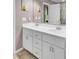 Bright bathroom featuring double sink vanity, framed mirror and wall decor at 1954 Treebark Dr, Charleston, SC 29414