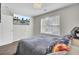 Comfortable bedroom with TV, fan, and window at 1954 Treebark Dr, Charleston, SC 29414